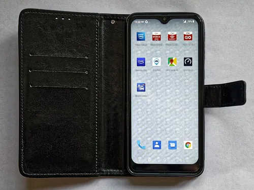 Blackview A60 Andoid Go mobile phone smartphone cell phone in a dedicated folio case cover with magnetic clip.Mobile device view: Wikimedia 
